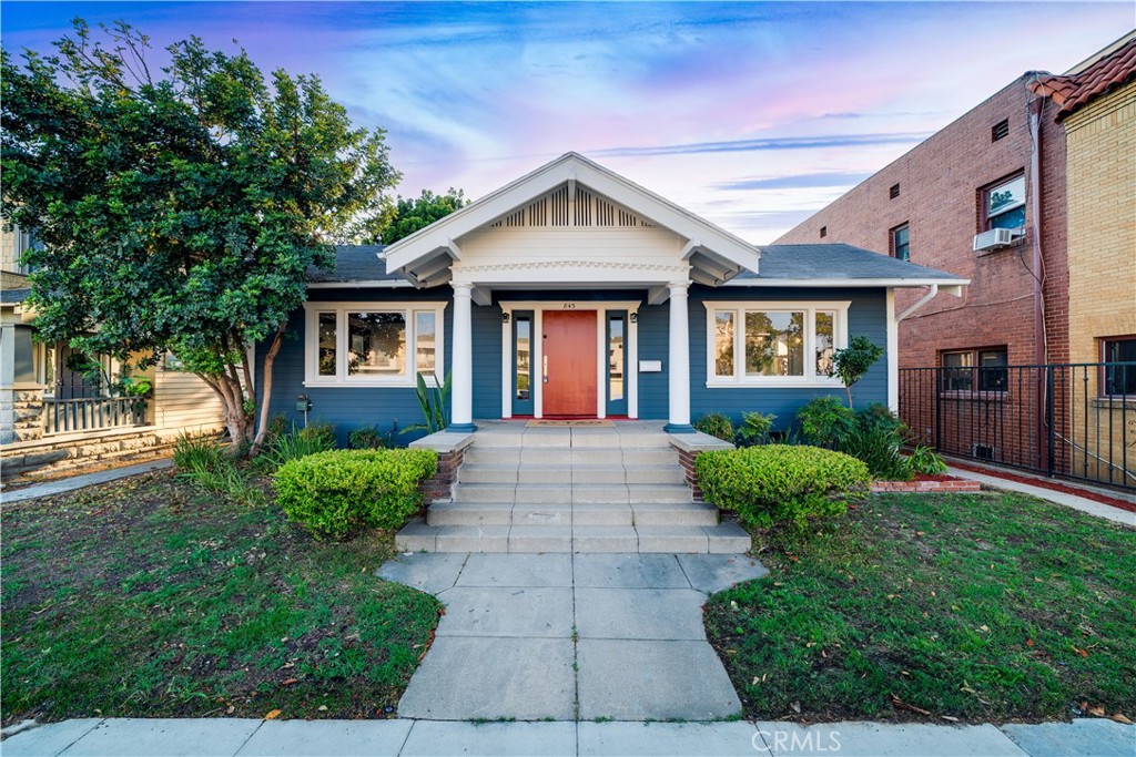 843 Cedar Avenue Long Beach, CA 90813 - Photo 2 of 42 a front view of a house with garden