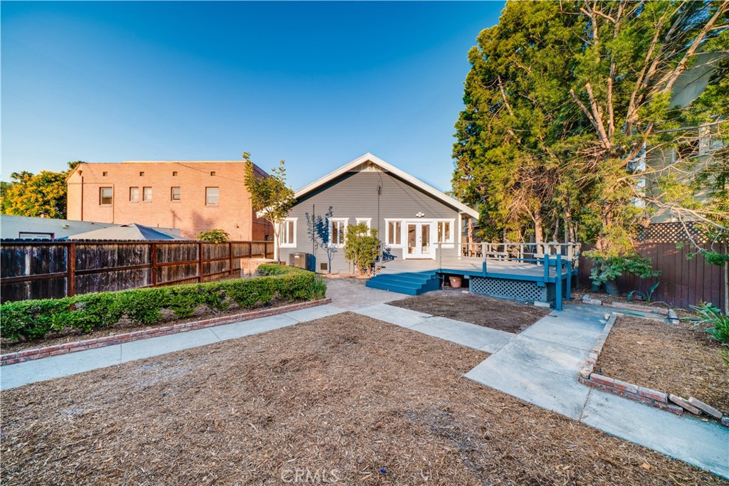 843 Cedar Avenue Long Beach, CA 90813 - Photo 24 of 42 a front view of a house with garden