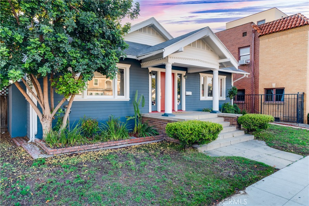 843 Cedar Avenue Long Beach, CA 90813 - Photo 3 of 42 a front view of a house with garden