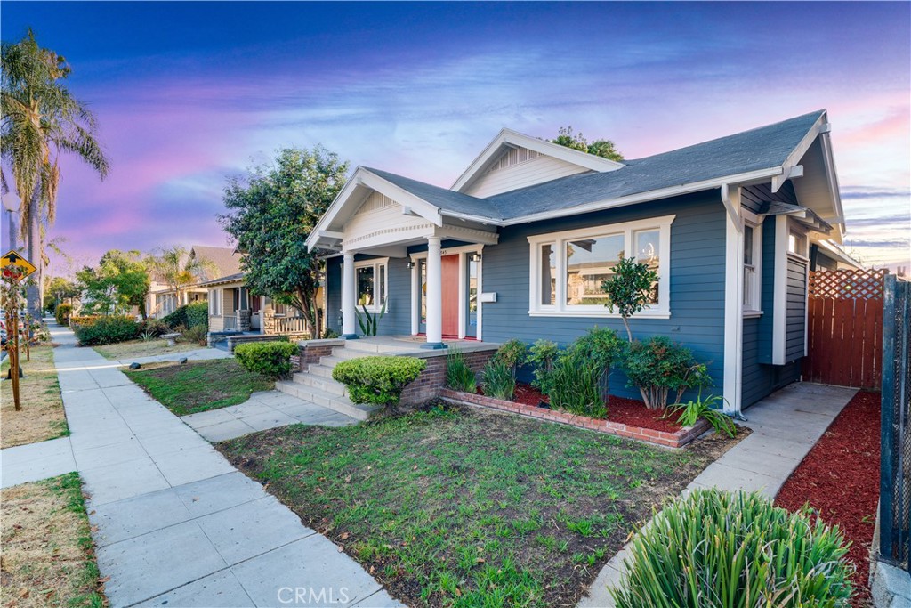 843 Cedar Avenue Long Beach, CA 90813 - Photo 4 of 42 a front view of a house with garden