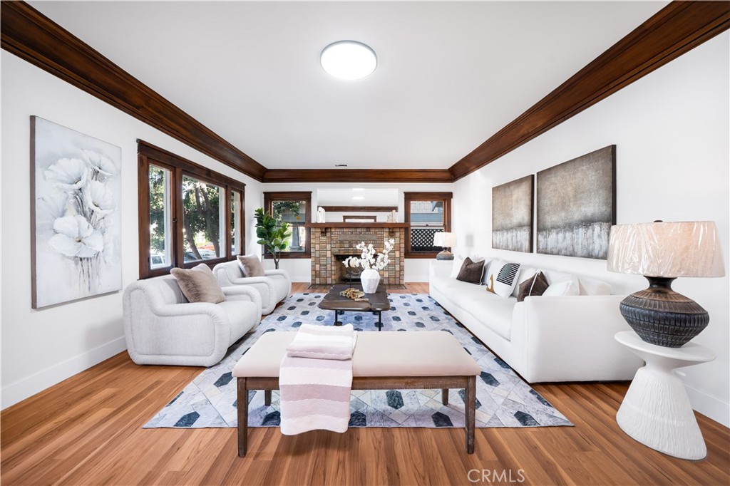 843 Cedar Avenue Long Beach, CA 90813 - Photo 5 of 42 a living room with furniture large window and wooden floor