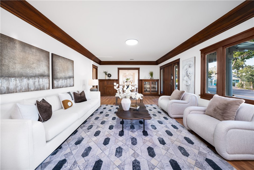 843 Cedar Avenue Long Beach, CA 90813 - Photo 7 of 42 a living room with furniture fireplace and large window
