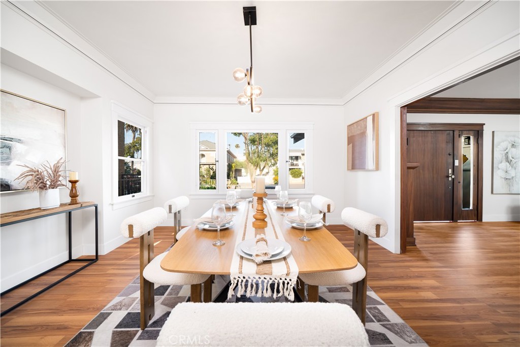 843 Cedar Avenue Long Beach, CA 90813 - Photo 10 of 42 a view of a dining room with furniture window and wooden floor