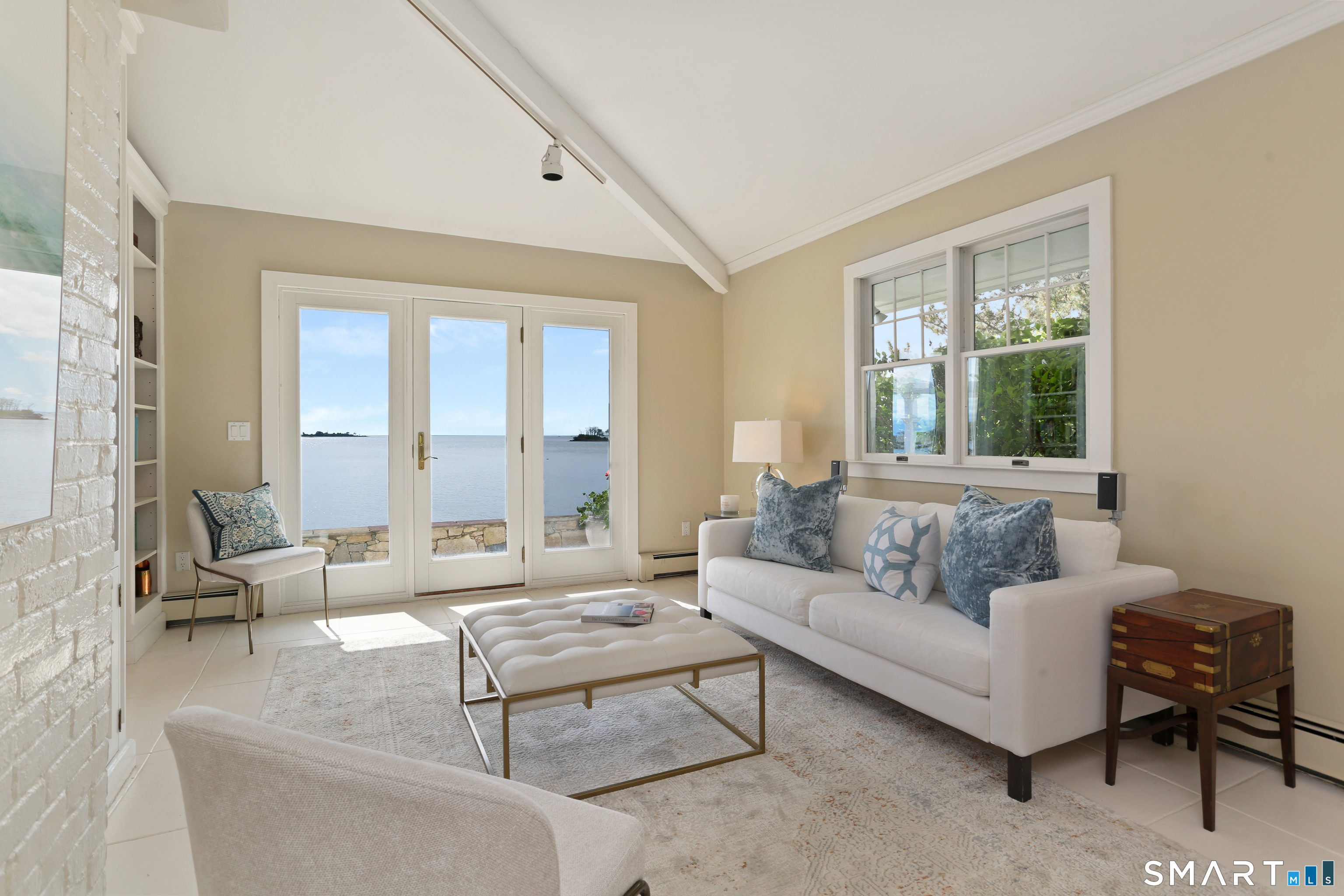 34 Shorehaven Road Norwalk, CT 06855 - Photo 22 of 40 a living room with furniture and a large window