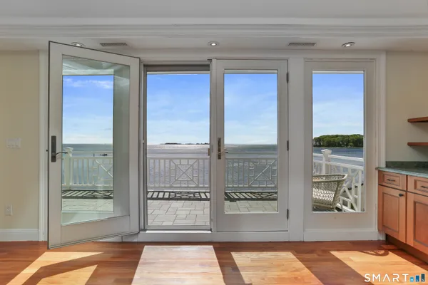 a view of a room that has a large window