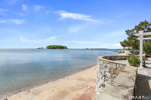a view of a lake with a yard