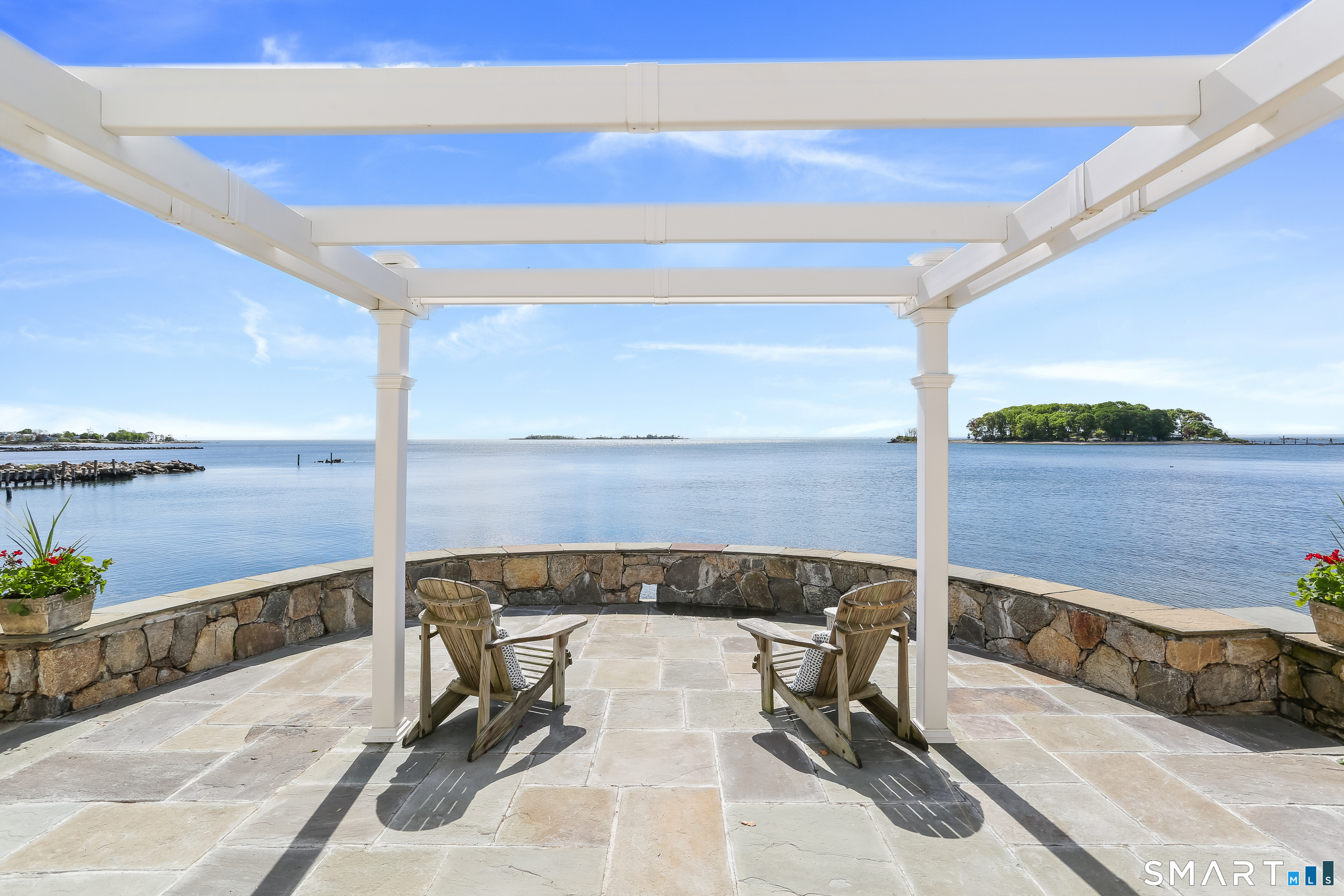 34 Shorehaven Road Norwalk, CT 06855 - Photo 32 of 40 a view of a terrace with seating space