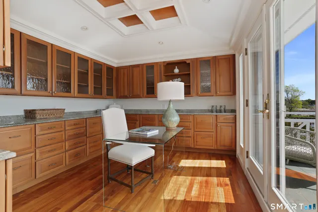 a spacious bathroom with a sink and a large mirror