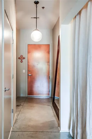 a view of a hallway with entryway