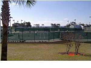 31-167 Riverview Road Navarre, FL 32566 - Photo 7 of 11 a view of a swimming pool and a yard