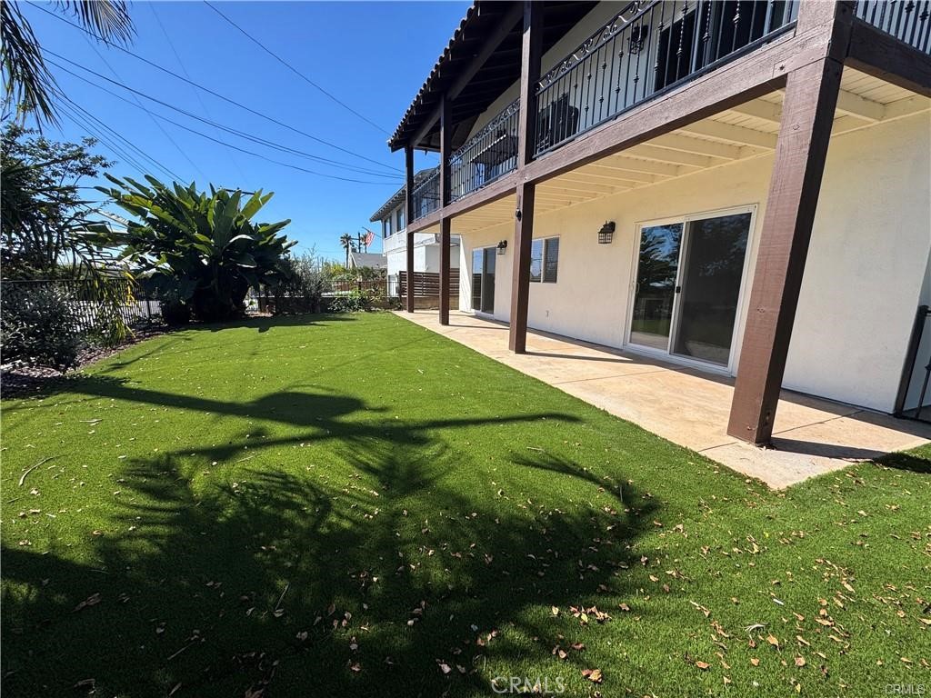 24732 Cordova Drive, Unit B Dana Point, CA 92629 - Photo 2 of 8 a backyard of a house with plants and wooden fence