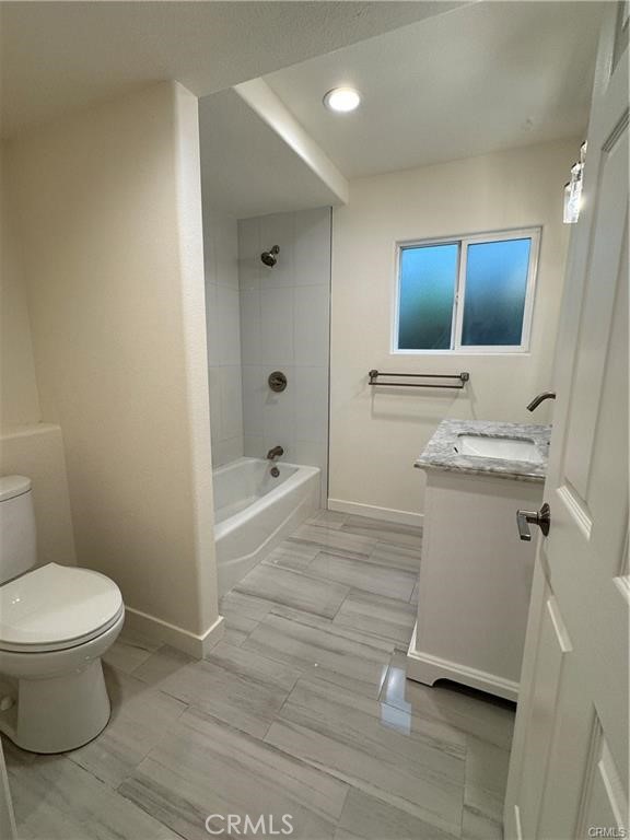 24732 Cordova Drive, Unit B Dana Point, CA 92629 - Photo 3 of 8 a bathroom with a sink toilet and shower