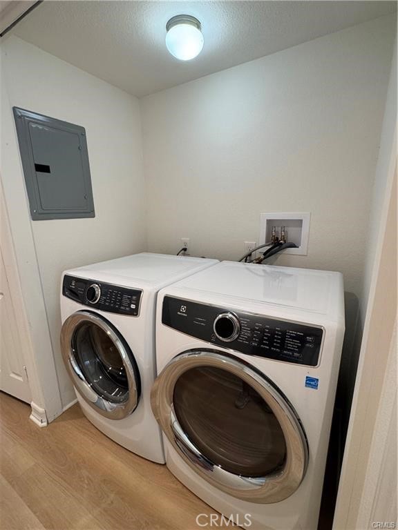24732 Cordova Drive, Unit B Dana Point, CA 92629 - Photo 7 of 8 a utility room with dryer and washer