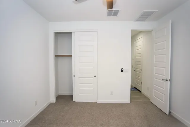 an empty room with closet