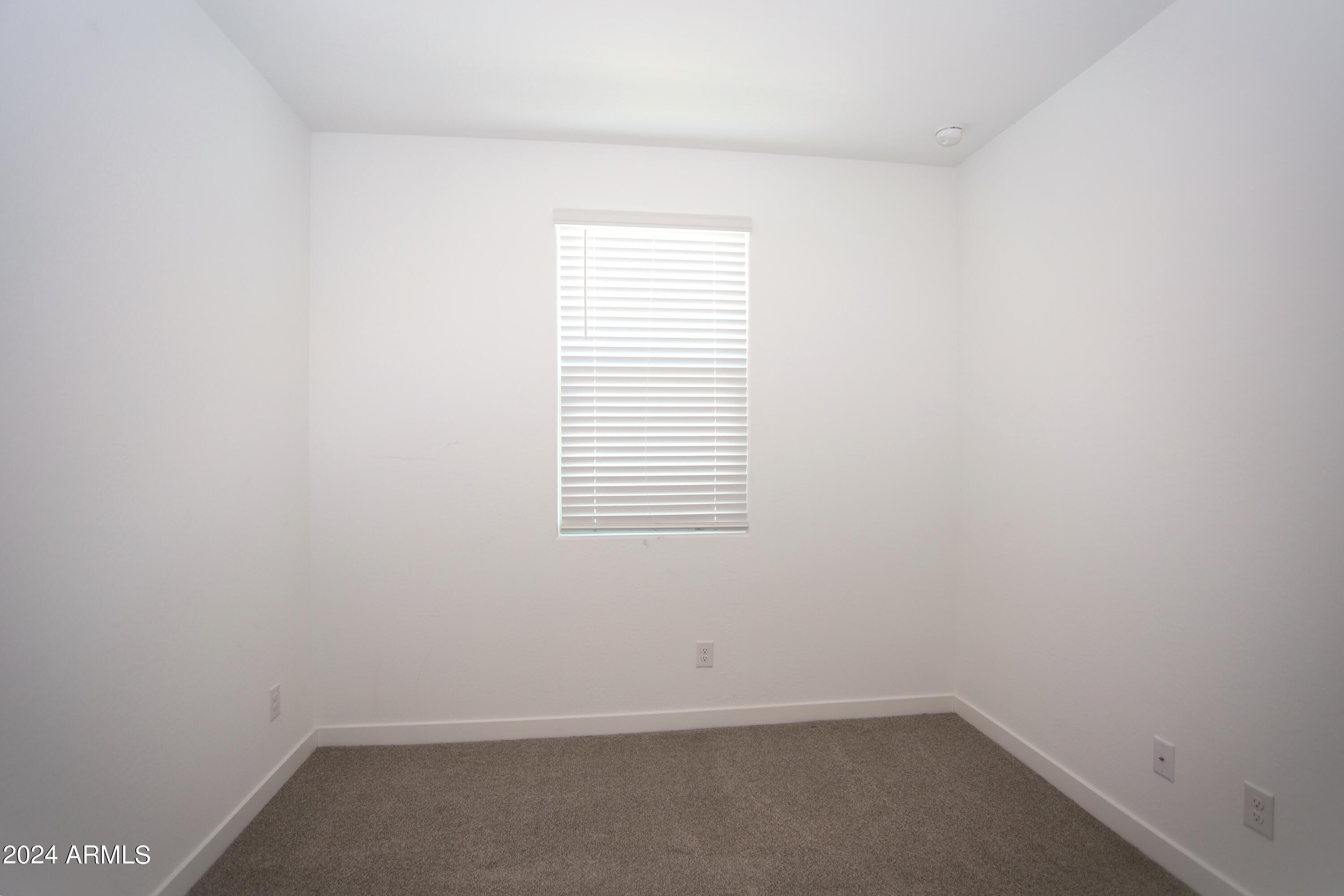 1651 West Piedmont Road Phoenix, AZ 85041 - Photo 7 of 46 a small space with a window