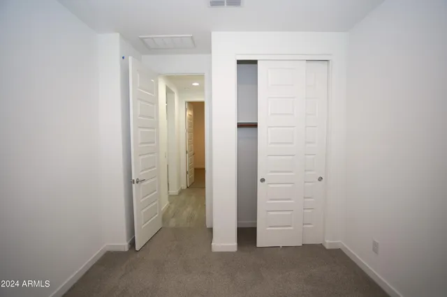 an empty room with closet