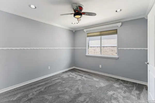 a view of a window in an empty room