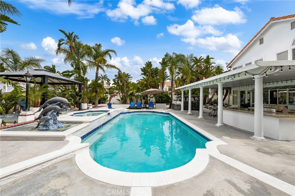 950 Chantel Drive Corona, CA 92879 - Photo 22 of 27 a view of a swimming pool with a patio