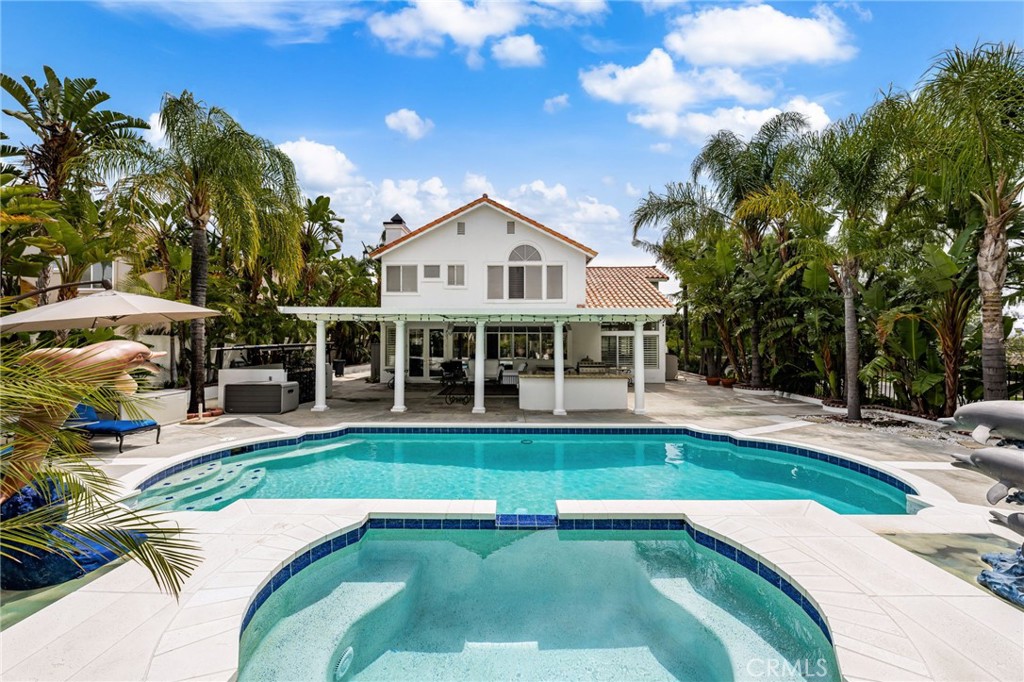 950 Chantel Drive Corona, CA 92879 - Photo 24 of 27 a view of a house with swimming pool and sitting area