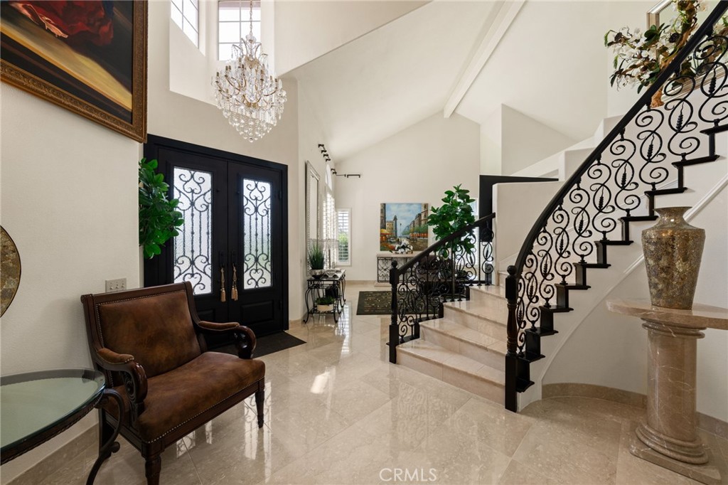 950 Chantel Drive Corona, CA 92879 - Photo 5 of 27 a living room with furniture and a chandelier