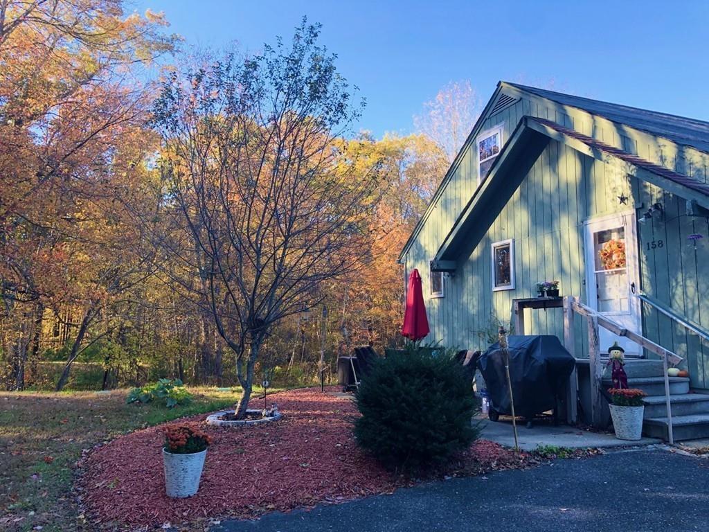 158 Osborne Road Ware, MA 01082 - Photo 1 of 31 a view of a house with a yard