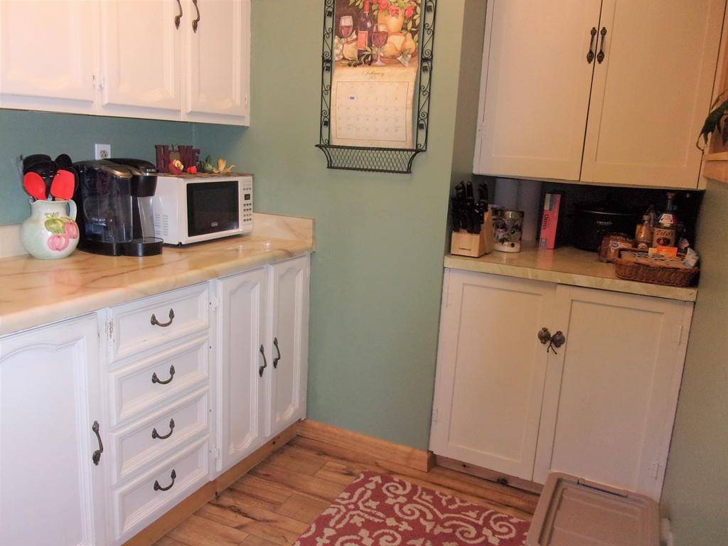 158 Osborne Road Ware, MA 01082 - Photo 13 of 31 a view of cabinets with wooden floor
