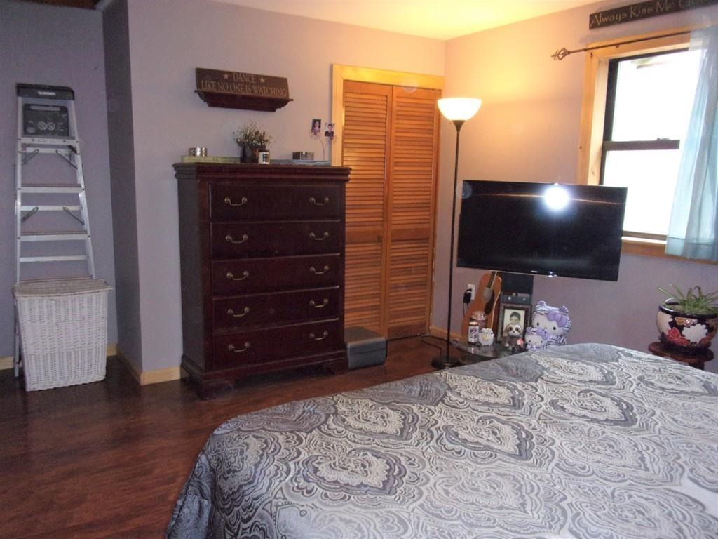 158 Osborne Road Ware, MA 01082 - Photo 25 of 31 a bedroom with a bed and a flat screen tv