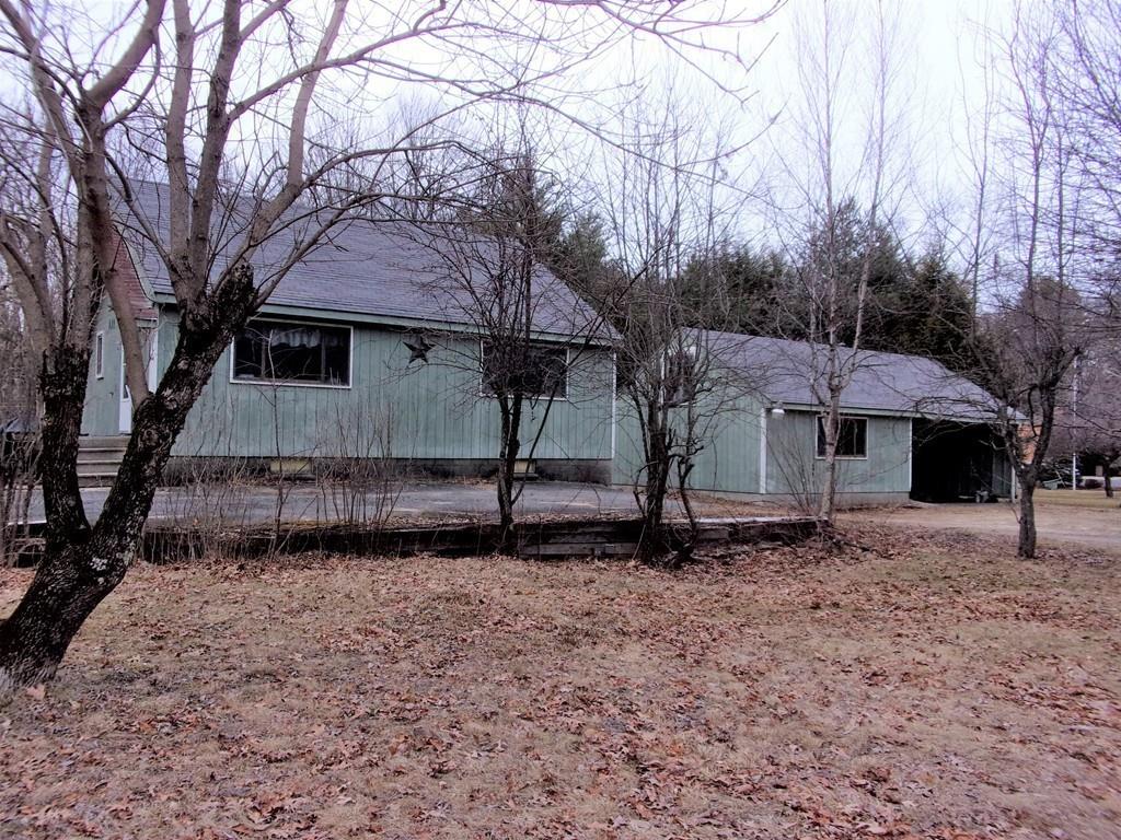 158 Osborne Road Ware, MA 01082 - Photo 3 of 31 a view of a house with a yard