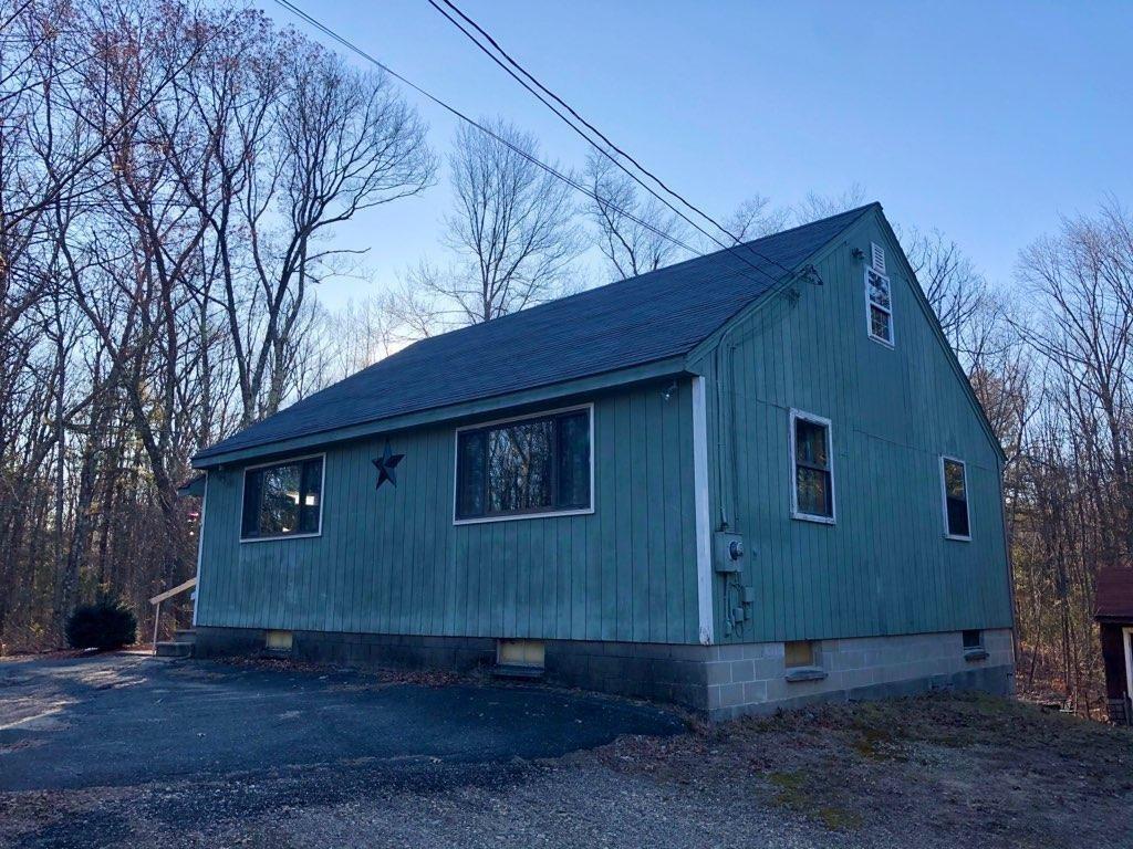 158 Osborne Road Ware, MA 01082 - Photo 4 of 31 a view of a house with a yard