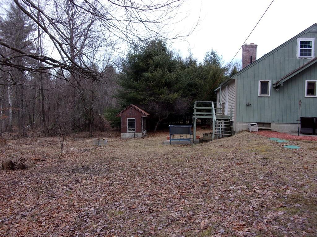 158 Osborne Road Ware, MA 01082 - Photo 7 of 31 a view of a house with a yard and tree