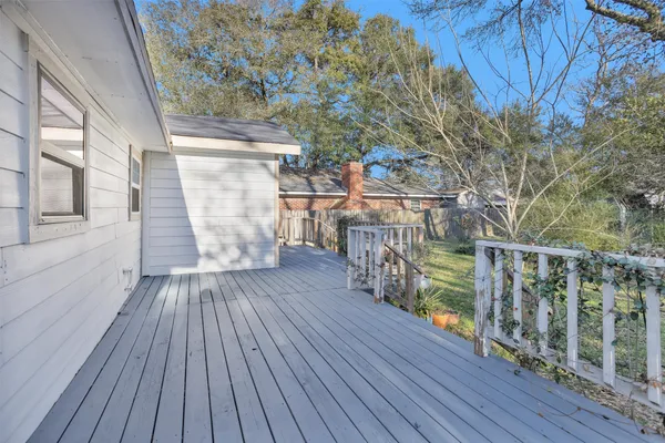 a view of outdoor space with wooden floor