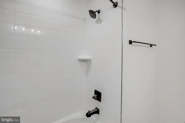 a view of empty room with windows