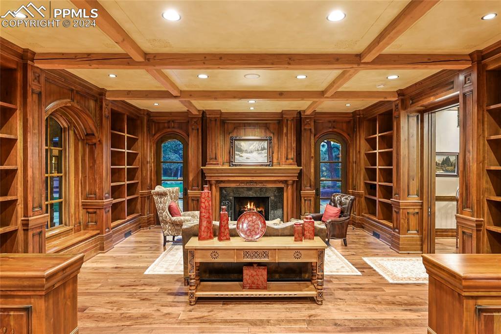 22 Crossland Road Colorado Springs, CO 80906 - Photo 13 of 49 a living room with furniture fireplace and a flat screen tv
