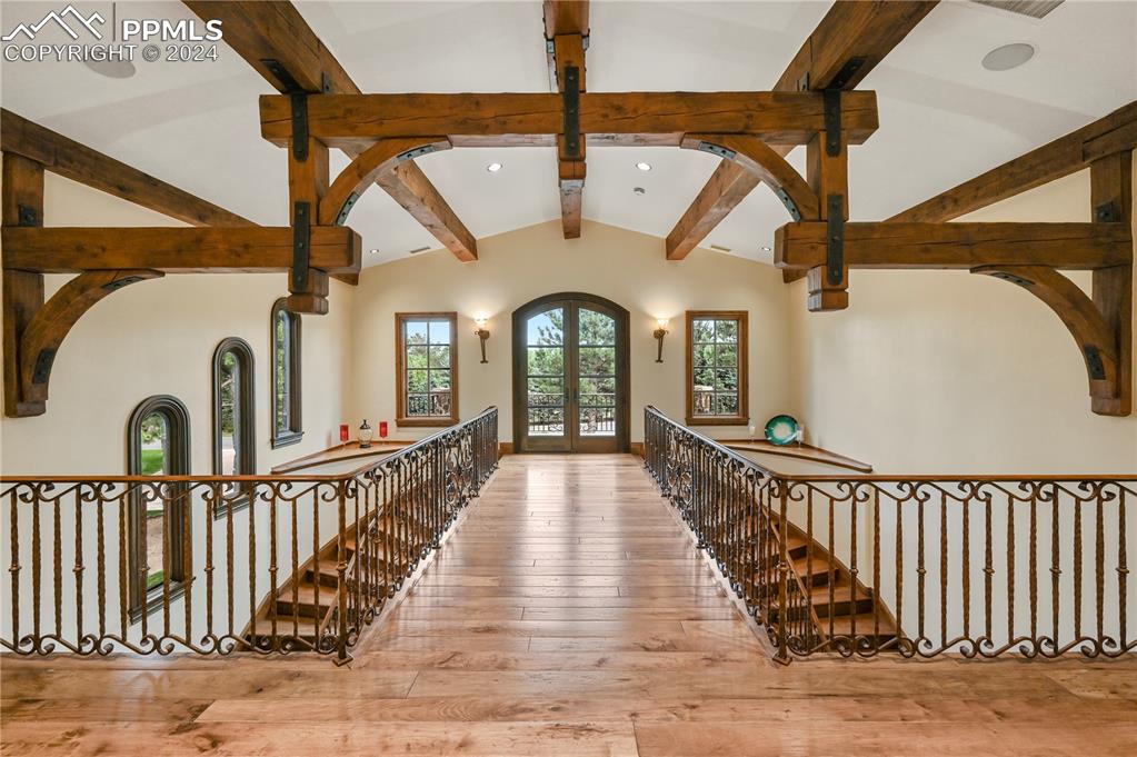 22 Crossland Road Colorado Springs, CO 80906 - Photo 22 of 49 a view of a hallway with wooden floor and furniture