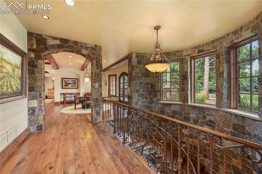 22 Crossland Road Colorado Springs, CO 80906 - Photo 30 of 49 a very nice looking room with wooden floor and furniture