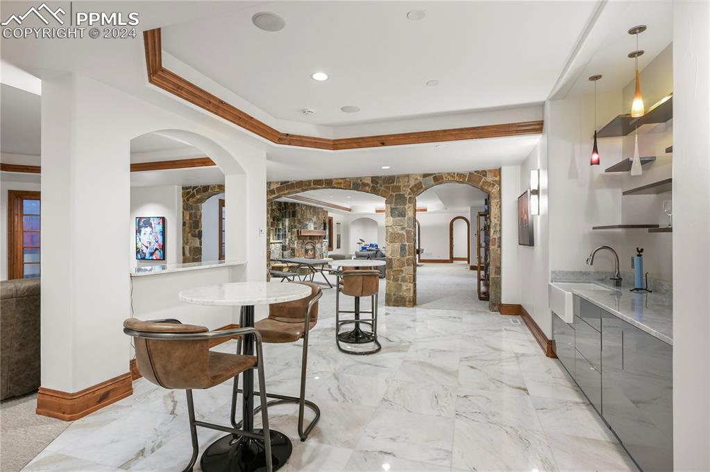 22 Crossland Road Colorado Springs, CO 80906 - Photo 33 of 49 a living room with fireplace and furniture