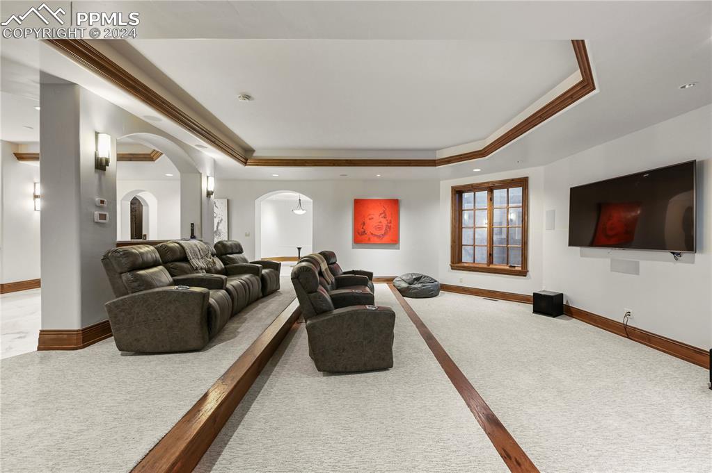 22 Crossland Road Colorado Springs, CO 80906 - Photo 34 of 49 a living room with furniture and a flat screen tv