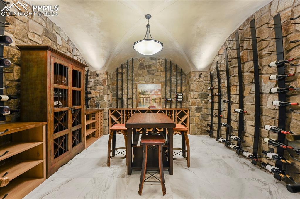 22 Crossland Road Colorado Springs, CO 80906 - Photo 35 of 49 a view of a dining room with furniture and chandelier