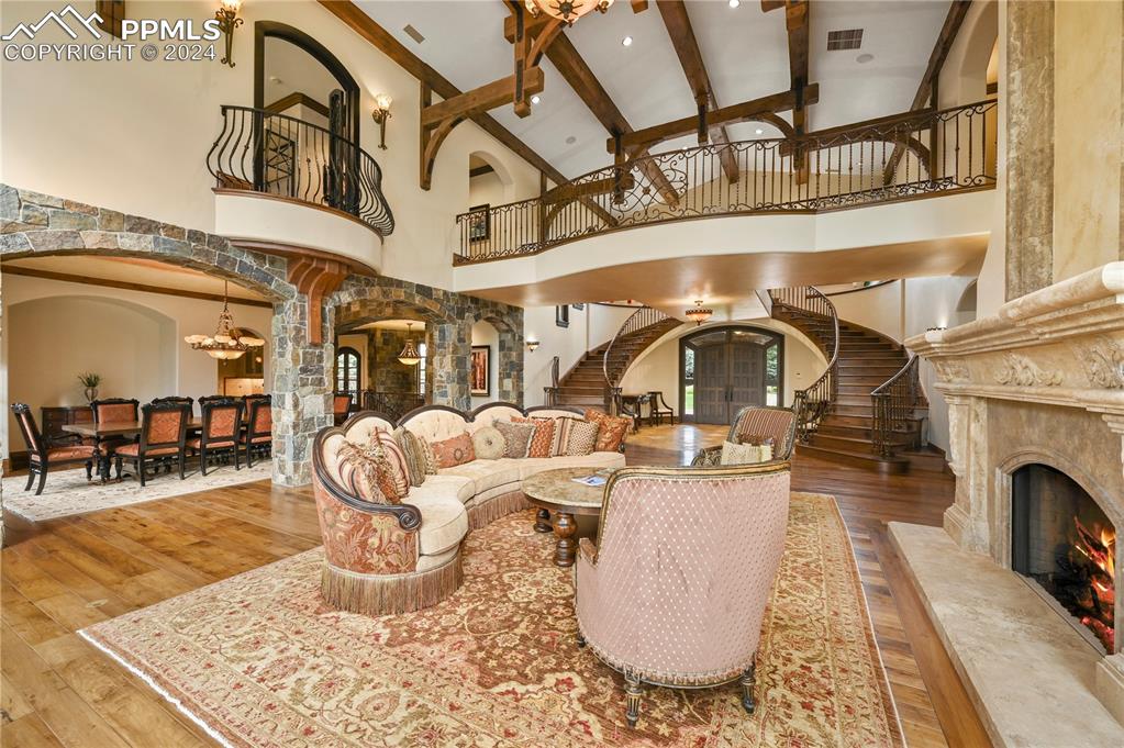 22 Crossland Road Colorado Springs, CO 80906 - Photo 6 of 49 a view of a livingroom with furniture a fireplace a rug a fireplace and windows
