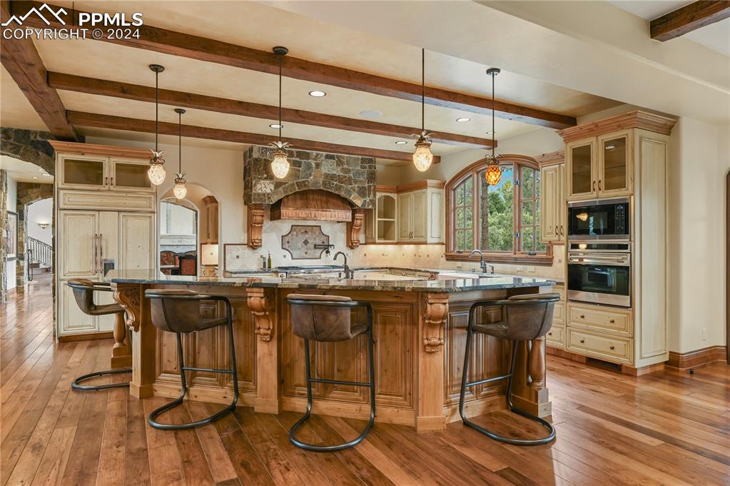 22 Crossland Road Colorado Springs, CO 80906 - Photo 8 of 49 a kitchen with a table and chairs in it