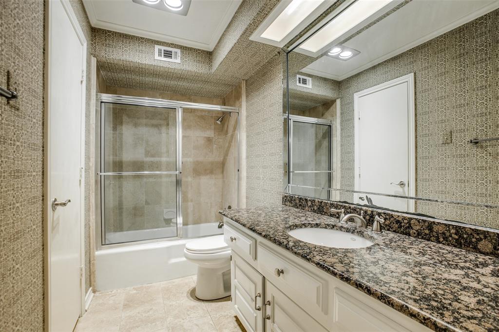 2700 Quail Ridge Drive Carrollton, TX 75006 - Photo 14 of 30 Bathroom with vanity, bath / shower combo with glass door, ornamental molding, wallpapered walls, and recessed lighting