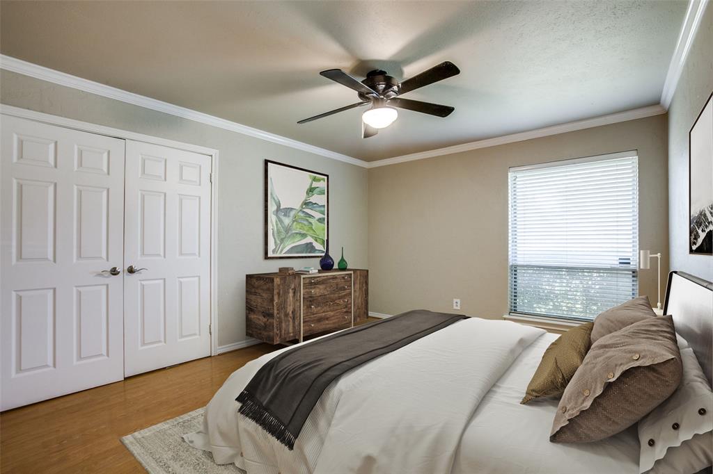 2700 Quail Ridge Drive Carrollton, TX 75006 - Photo 27 of 30 Bedroom featuring crown molding, ceiling fan, wood finished floors, and a closet