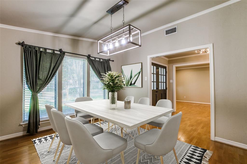 2700 Quail Ridge Drive Carrollton, TX 75006 - Photo 4 of 30 Dining area featuring ornamental molding, wood finished floors, and french doors