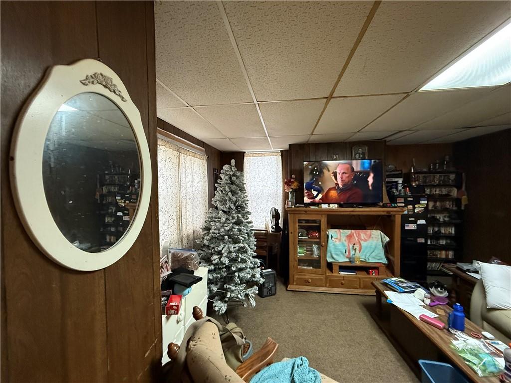 328 West Cunningham Street Butler, PA 16001 - Photo 13 of 15 a living room with furniture and a fireplace