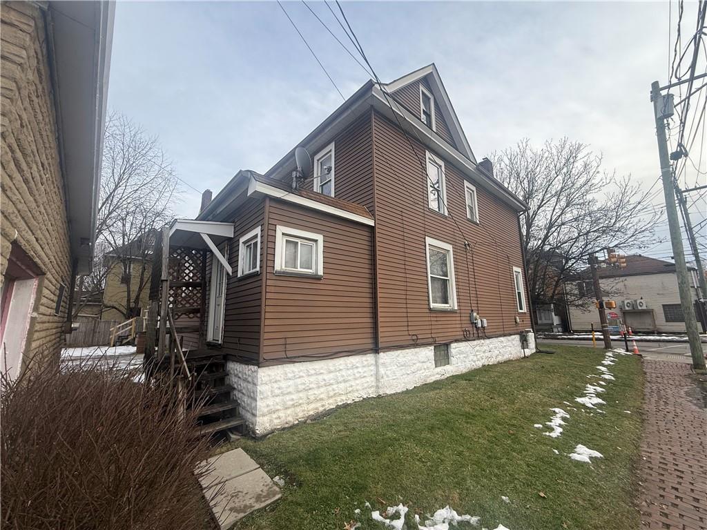 328 West Cunningham Street Butler, PA 16001 - Photo 5 of 15 a front view of a house with a yard
