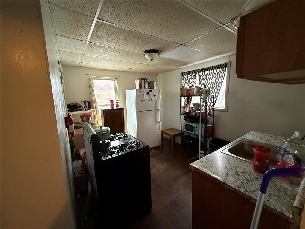 328 West Cunningham Street Butler, PA 16001 - Photo 8 of 16 a bedroom with a bed and a table