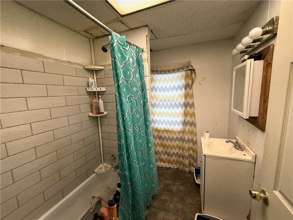 328 West Cunningham Street Butler, PA 16001 - Photo 8 of 15 a bathroom with a shower and a tub