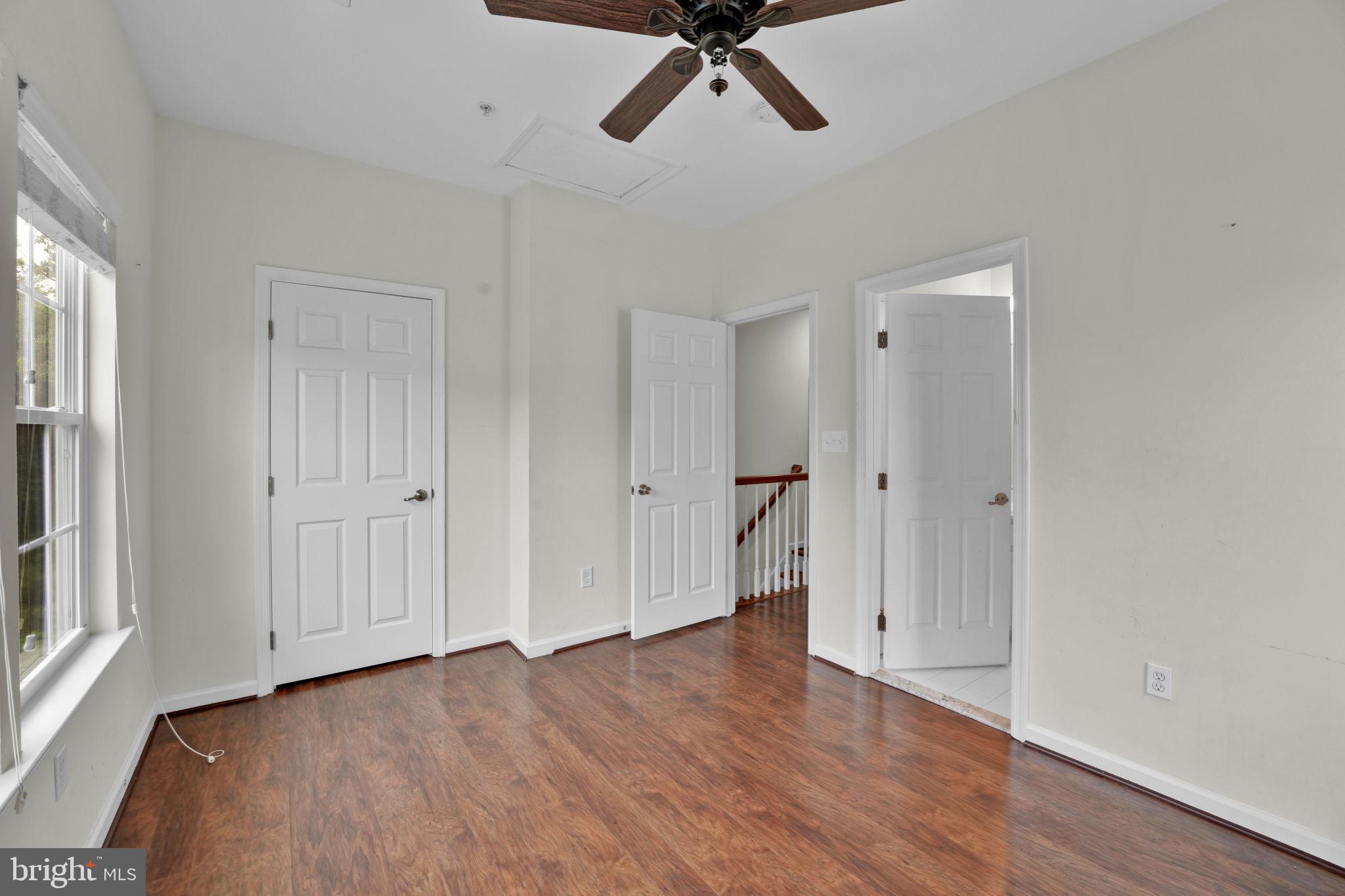 7138 Station House Road Elkridge, MD 21075 - Photo 8 of 42 a view of a room with wooden floor and white walls