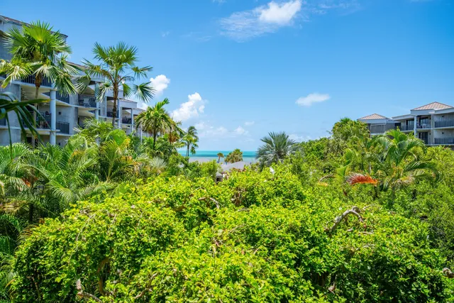 a view of parking garage with cars