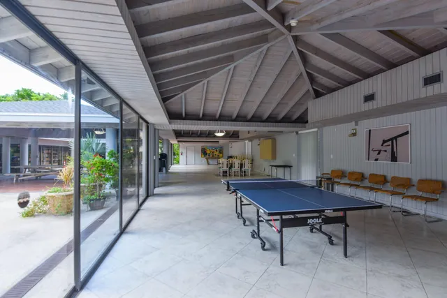 a view of a house with a street